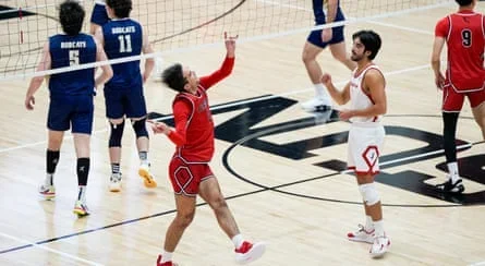 Jordan Lucas celebrates a point during a volleyball game
